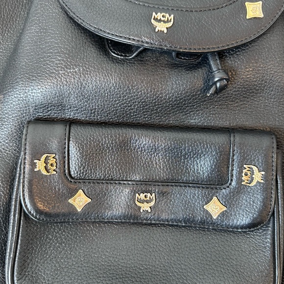 MCM Black Leather Drawstring Shoulder Backpack with Gold Accents - Picture 4 of 11